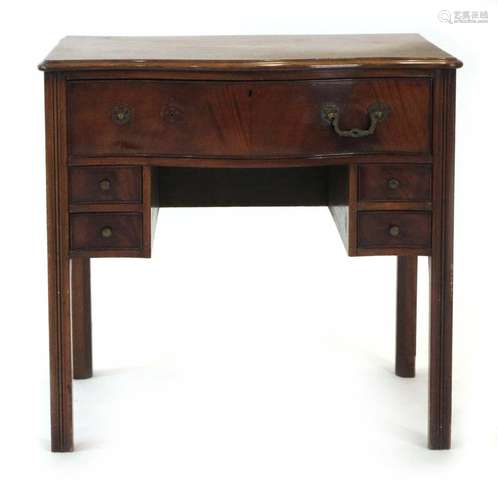 A Georgian mahogany serpentine fronted lowboy with one long drawer and four smaller drawers,