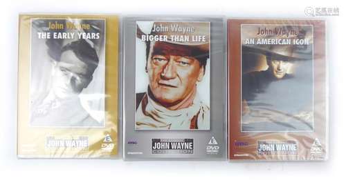 John Wayne Film Archive consisting of 96 DVDs ( unused in shrink wrap ) & three biographical DVDs