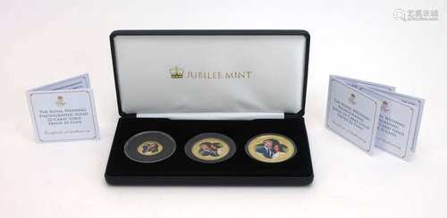 A cased set of three The Royal Wedding Photographic 22ct gold proof coins including a £5, £2 and £1,