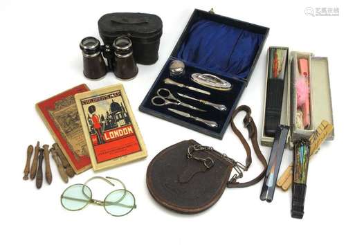 A mixed group of collectables including a cased silver manicure set, a sporran,