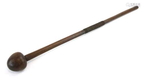 A 19th Century Zulu knobkerrie with a silvered thread handle and later nicks to the shaft