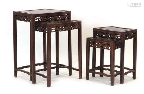 A nest of four Chinese hardwood tables of curved form, max w.