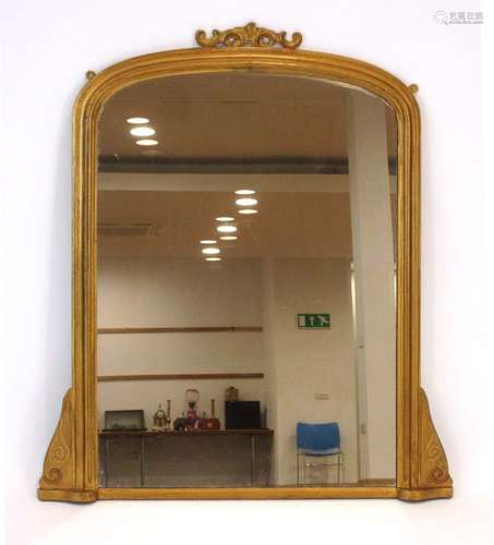 An overmantle mirror, the glazed plate in a giltwood frame,