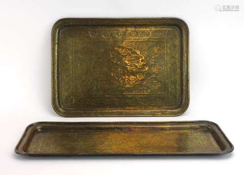 Two Persian brass trays engraved with foliate bands and a hunt