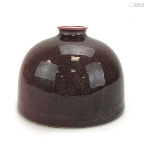 A Chinese sang de boeuf 'beehive' water pot of typical form, six character Kangxi mark to base,