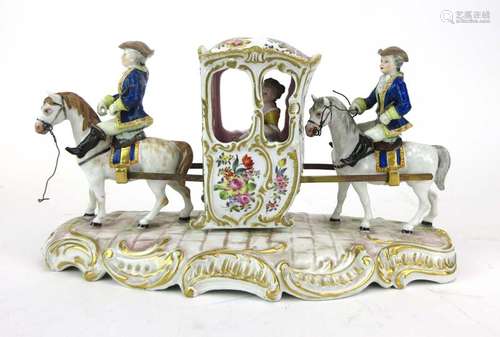 A Continental figural group modelled as a pair of mounted figures carrying a sedan chair,