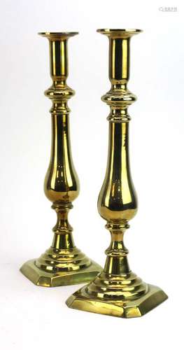 A pair of 19th century brass ejector candlesticks, h.