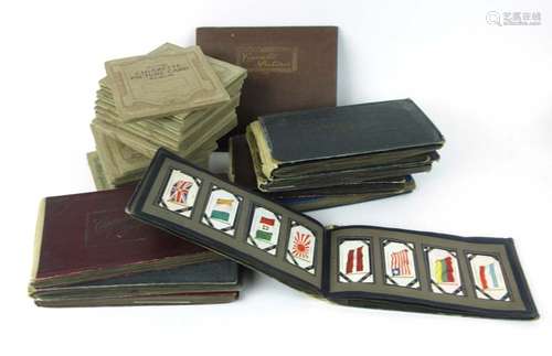 Cigarette Cards : A miscellaneous and wide ranging collection of cigarette cards 'loosely' mounted