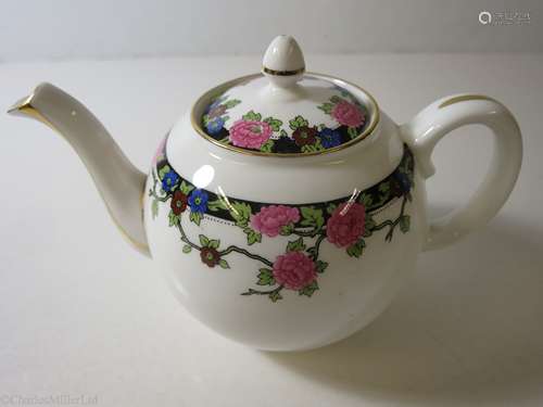 ELDER DEMPSTER: A FLORAL PATTERN PORCELAIN TEAPOT BY AYNSLEY, ENGLAND, CIRCA 1960