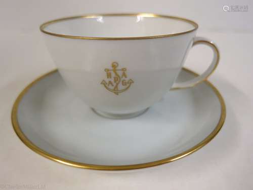 HAMBURG-AMERICAN (H.A.P.A.G.) LINE: A PALE BLUE PORCELAIN COFFEE CUP AND SAUCER BY FÜRSTENBERG,