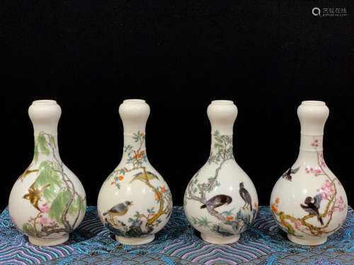 A SET OF GARLIC-HEAD-SHAPED PORCELAIN VASES