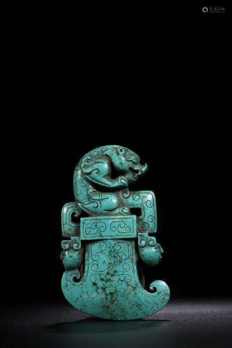 A TURQUOISE STONE ORNAMENT OF DRAGON SHAPED