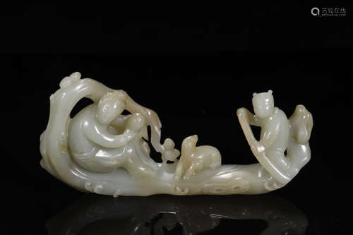 A HETIAN JADE ORNAMENT OF STORY-TELLING SHAPED