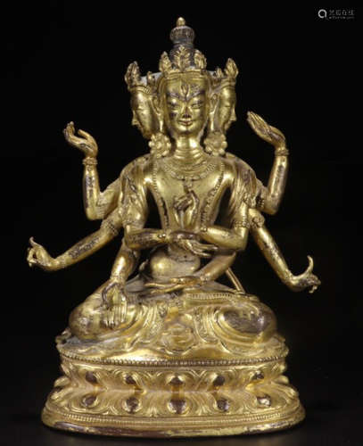 A GILT BRONZE GUANYIN SHAPED ORNAMENT