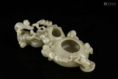 A HETIAN JADE BRUSH WASHER OF STORY SHAPED