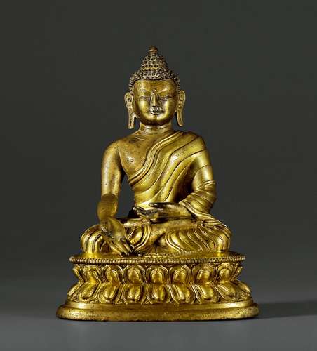 清乾隆·铜鎏金宝生佛坐像 QIANLONG PERIOD, QING DYNASTY A GILT-BRONZE FIGURE OF RATNASAMBHAVA