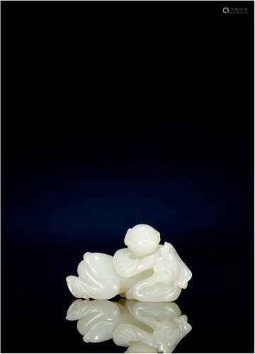 清·白玉童子戏鹅笔架 QING DYNASTY  A WHITE JADE ‘BOY AND GOOSE’ BRUSH HOLDER