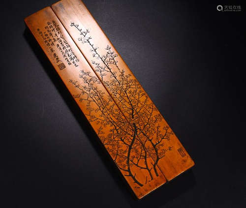 A PAIR OF RED WOOD POETRY RULERS WITH BAMBOO EMBEDDED