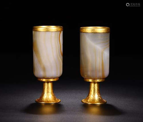 A PAIR OF AGATE& GILT SILVER CUP