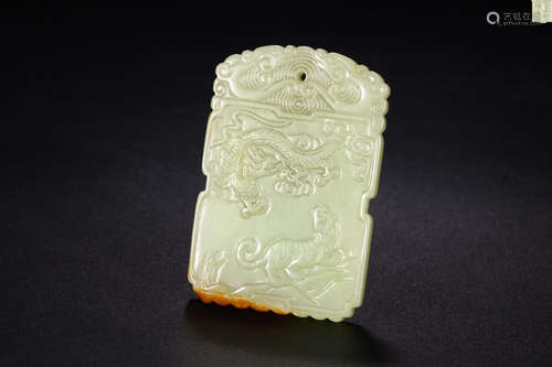 A HETIAN JADE PENDANT WITH BEAST PATTERN