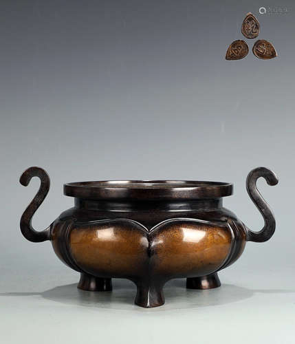 A COOPER CENSER WITH EARS