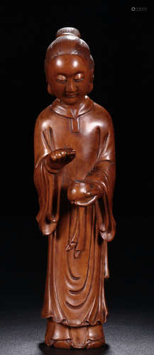 A HUANGYANG WOOD CHARACTER SHAPED ORNAMENT