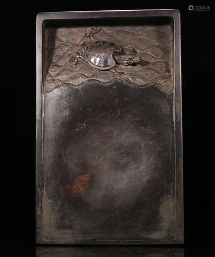 A HAND PIECE INK SLAB WITH FIGURE CRAVING