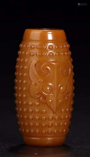 A HETIAN JADE PENDANT WITH BEAST FACE CARVED PATTERNS