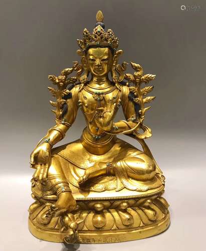 A GILT BRONZE FEMALE BUDDHA FIGURE