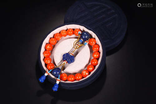 A CORAL 18 BEADS BRACELET