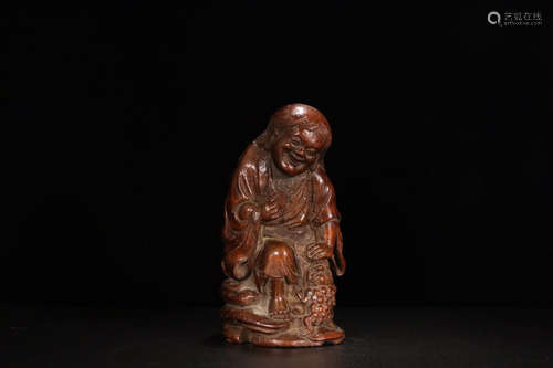 A BAMBOO STATUE ORNAMENT