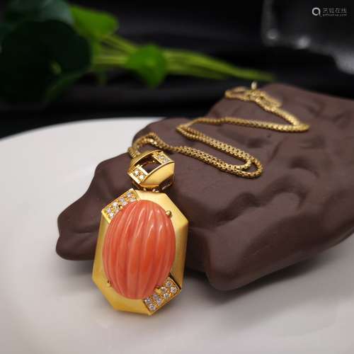 A MELON SHAPE MOMO TYPE RED CORAL PENDANT WITH 18K GOLD NECKLACE