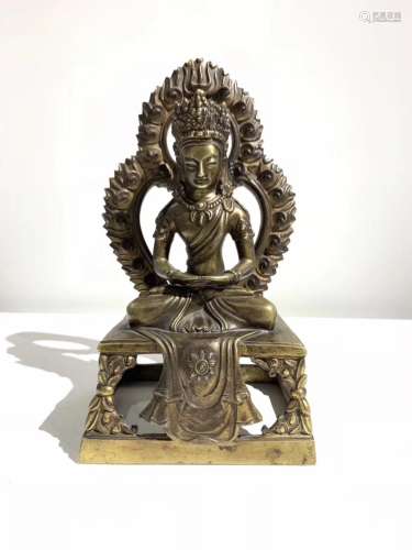 A GILT BRONZE BUDDHA FIGURE