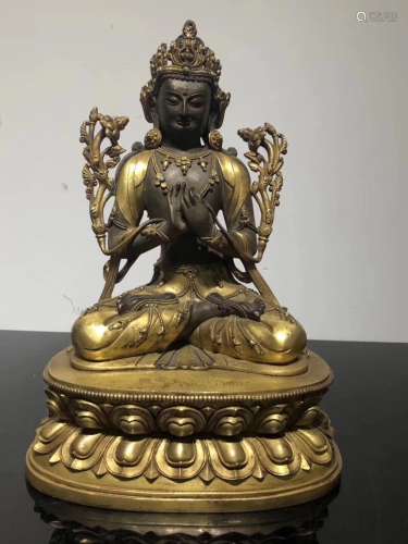 A GILT BRONZE BUDDHA FIGURE