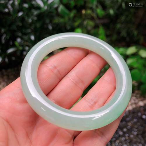 AN ICE COLOR JADEITE BANGLE