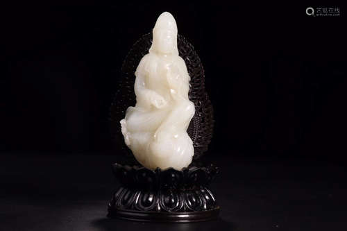 A HETIAN JADE GUANYIN SHAPED ORNAMENT