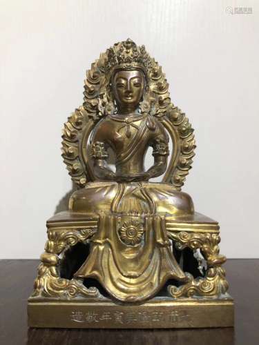 A GILT BRONZE BUDDHA FIGURE