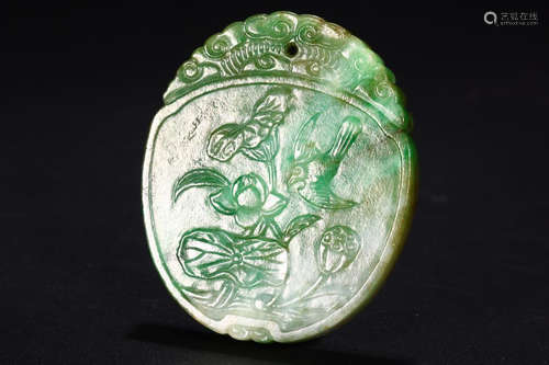 A BLOSSOM & BIRD CARVED JADEITE PENDANT