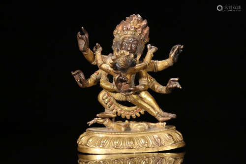 A GILT BRONZE BUDDHA