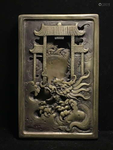 A STONE INK SLAB CARVED IN DRAGON