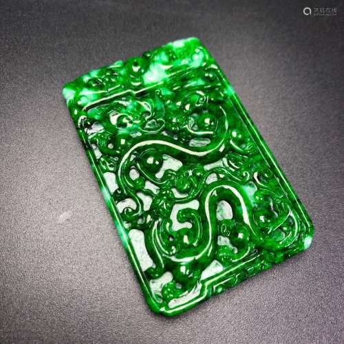A JADEITE TABLET WITH DRAGON PATTERNS