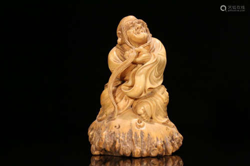 A LUJIAO STATUE ORNAMENT