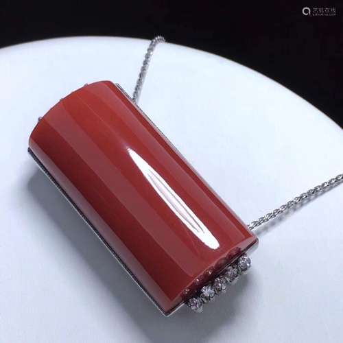 A RECTANGULAR AKA TYPE RED CORAL PENDANT WITH PLATINUM NECKLACE