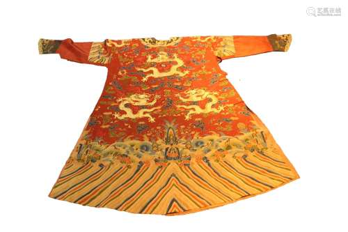 A RED ROBE WITH FLOWER AND DRAGON PATTERNS