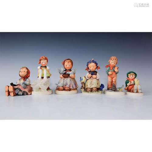 GROUPING OF HUMMEL FIGURINES