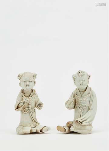 宋·湖田窑素胎童子一组两件 SONG DYNASTY  A GROUP OF TWO 'HUTIAN' BOYS