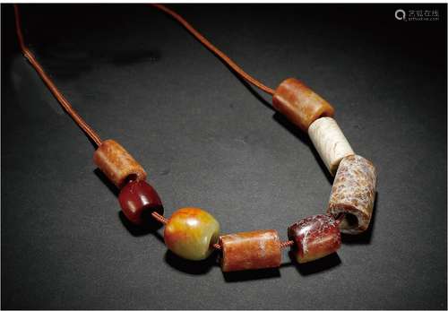 商·玉勒多宝串 SHANG DYNASTY  A JADE PENDANT