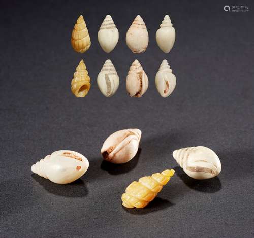 商·螺型仿生玉贝币一组四枚 SHANG DYNASTY  FOUR SEASHELL-SHAPED JADE COINS