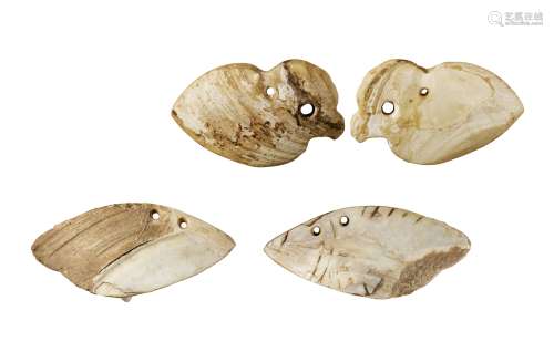 商·鸟形、鱼形双孔蚌贝币一组二枚 说明：本品为内蒙古红山文化的蚌贝币，双孔蚌贝币较为少见。