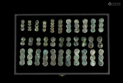 商·青铜连珠币一组三十三枚 SHANG DYNASTY  THIRTY-THREE BRONZE COINS